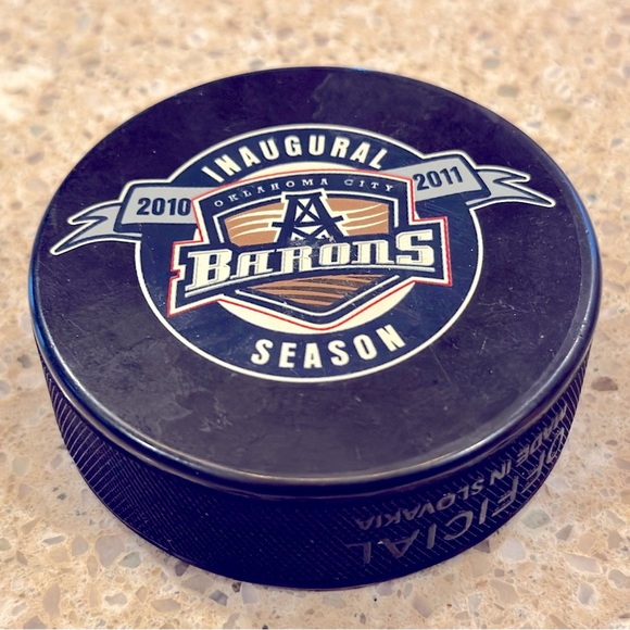 OKLAHOMA CITY BARONS AHL HOCKEY PUCK INGLASCO SHER-WOOD Official MADE /SLOVAKIA - Picture 1 of 9